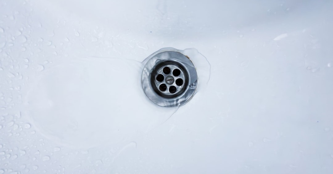 Water drains into a sink.